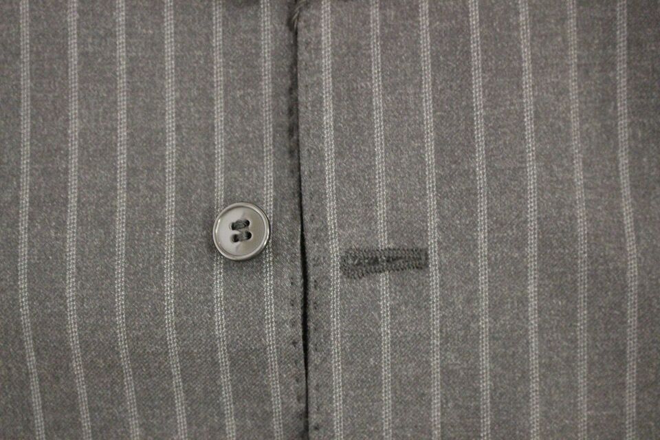 Gilet en laine rayé gris avec logo Dolce & Gabbana