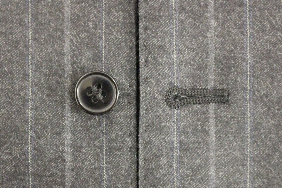 Gilet en laine rayé gris avec logo Dolce &amp; Gabbana
