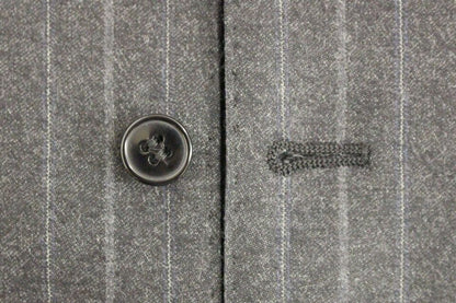 Gilet en laine rayé gris avec logo Dolce & Gabbana