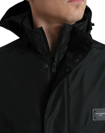 Dolce & Gabbana zwarte polyester jas met logo-plaatje en capuchon