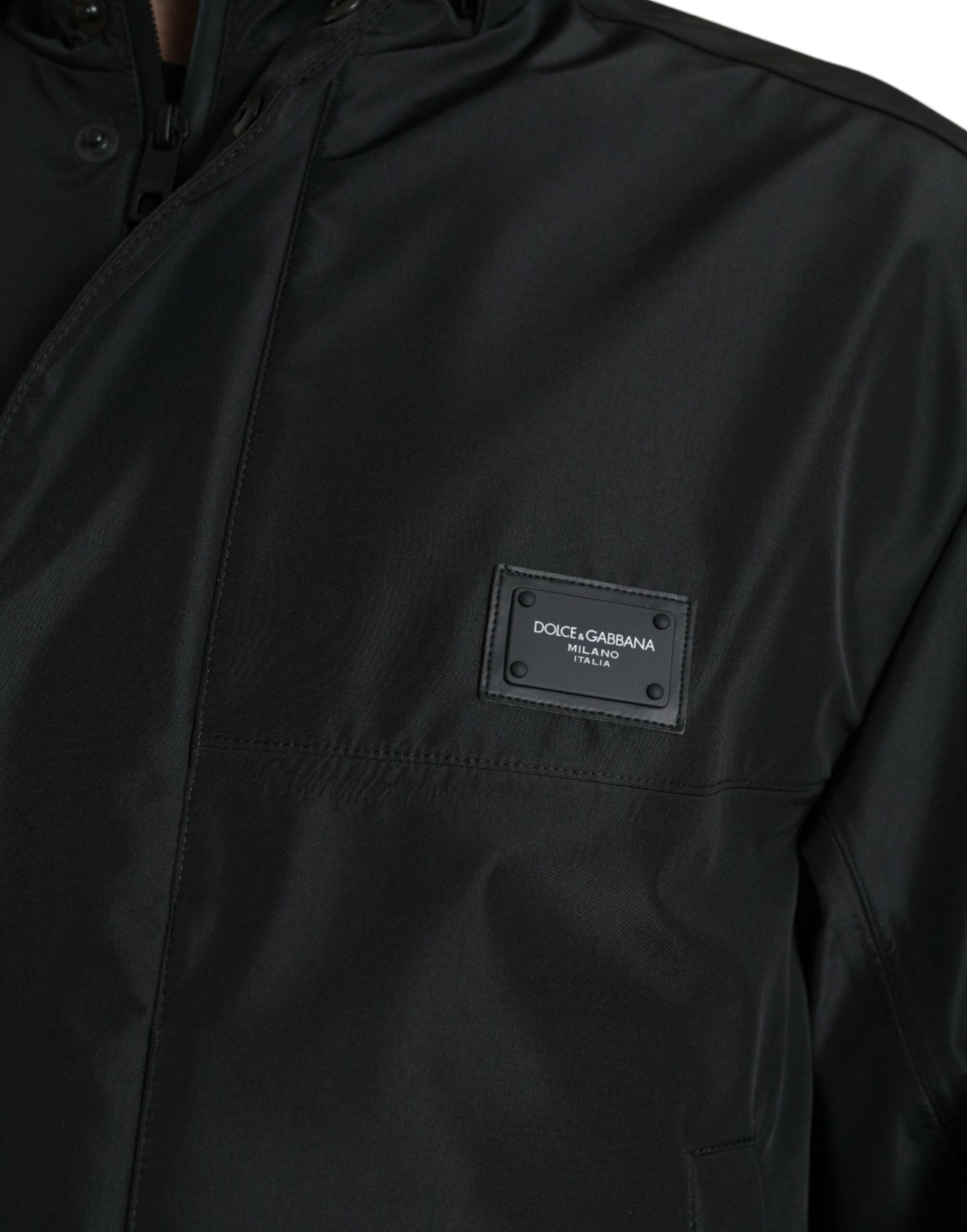 Dolce & Gabbana zwarte polyester jas met logo-plaatje en capuchon