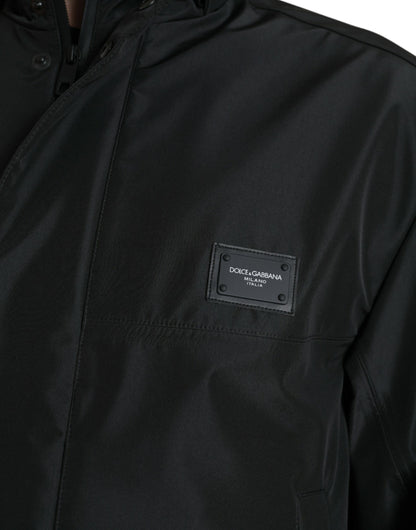 Dolce & Gabbana zwarte polyester jas met logo-plaatje en capuchon