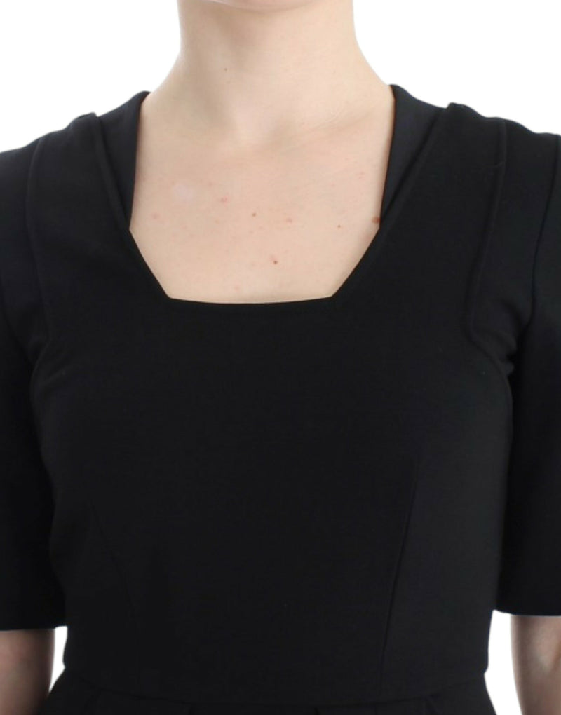 CO|TE Robe Venus noire à manches courtes