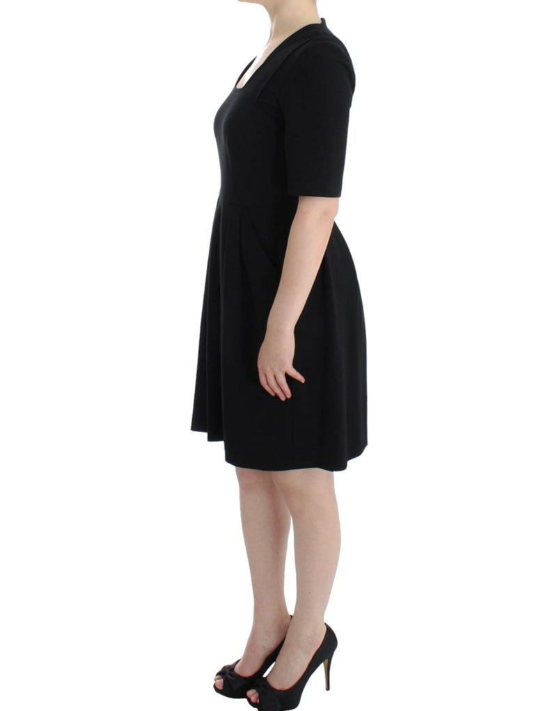 CO|TE Robe Venus noire à manches courtes