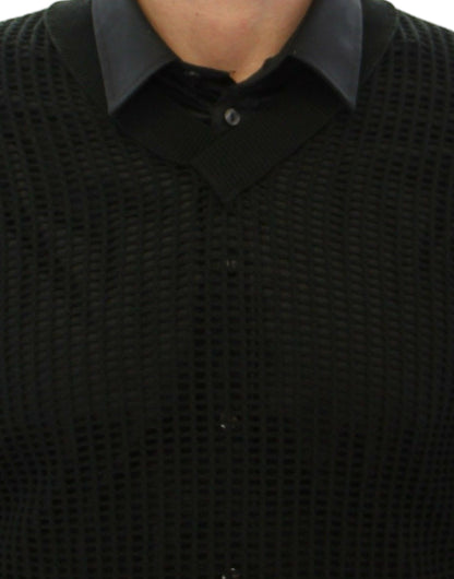 Pull en maille à mailles serrées vert foncé Dolce & Gabbana, vu sur le défilé.