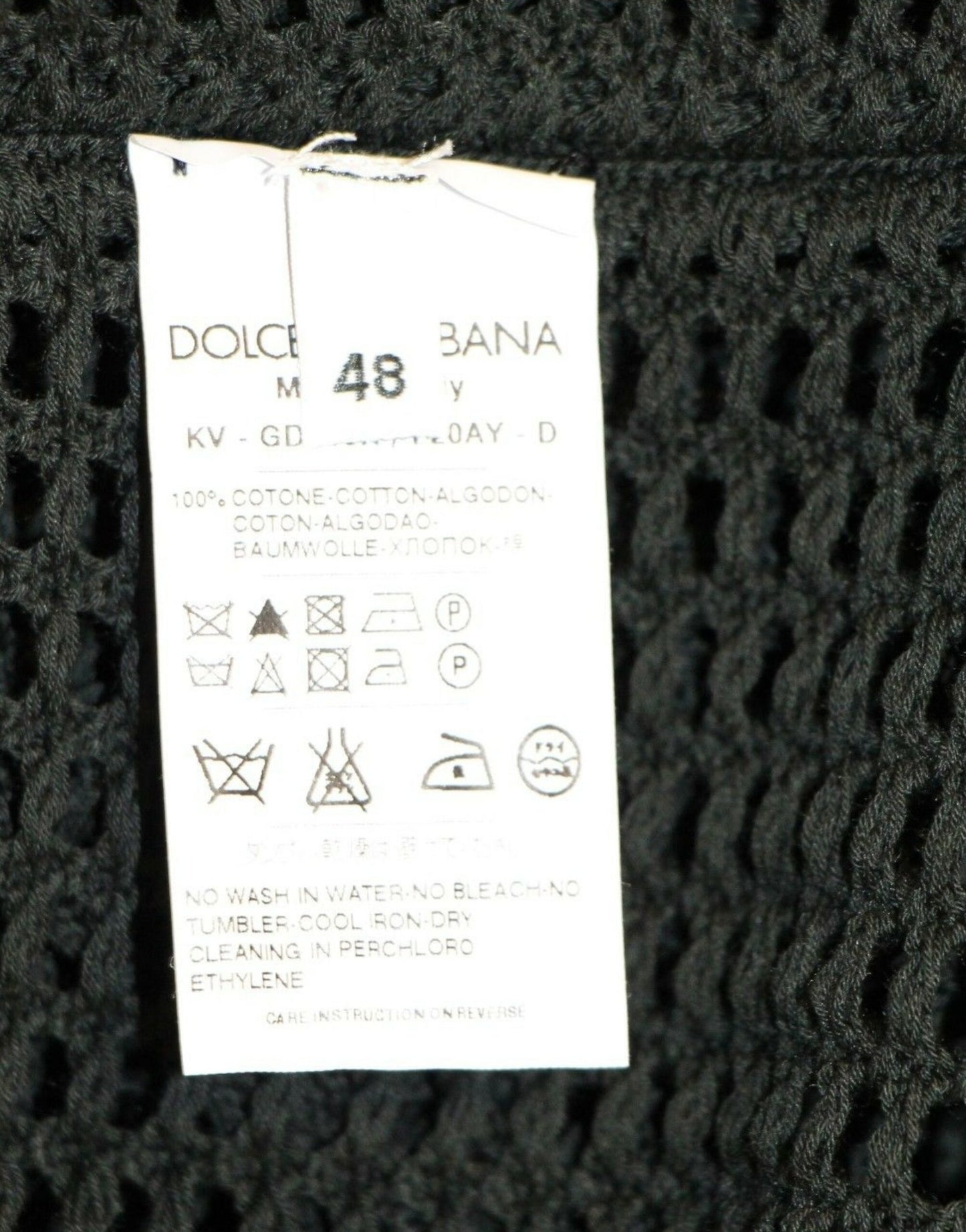 Pull en maille à mailles serrées vert foncé Dolce & Gabbana, vu sur le défilé.