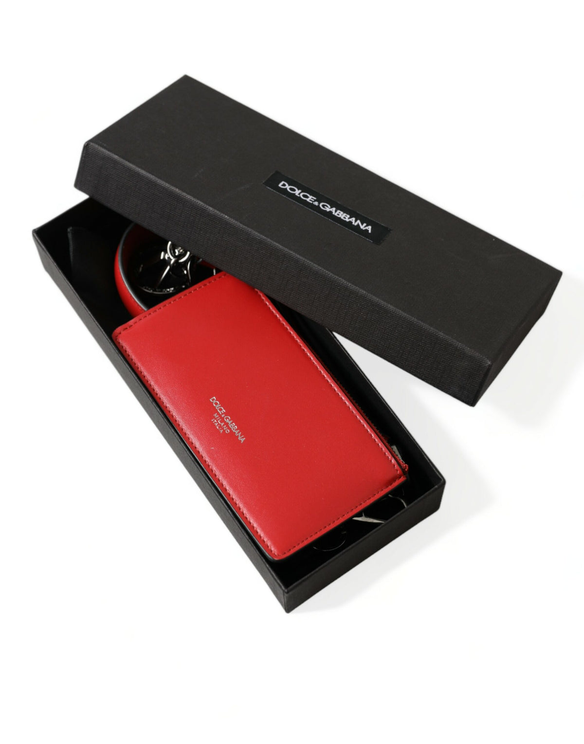 Étui pour Airpods Dolce &amp; Gabbana en cuir rouge avec logo en métal argenté