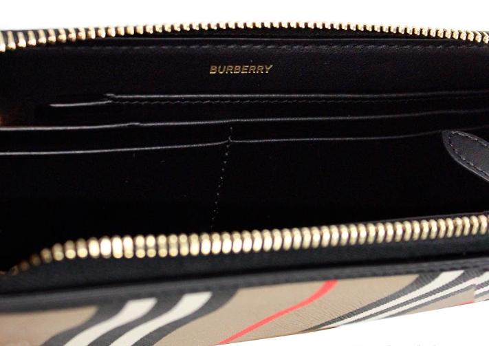 Portefeuille continental zippé Burberry Ellerby en cuir noir et toile à rayures emblématiques