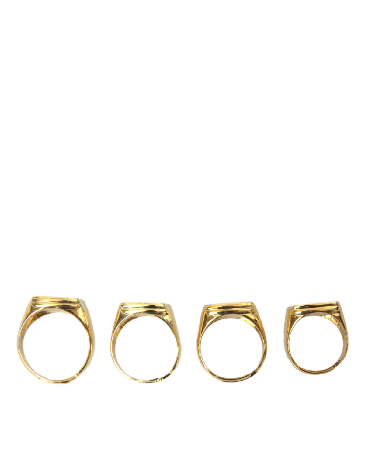 Dolce & Gabbana Lot de 4 bagues en laiton doré et émail KING