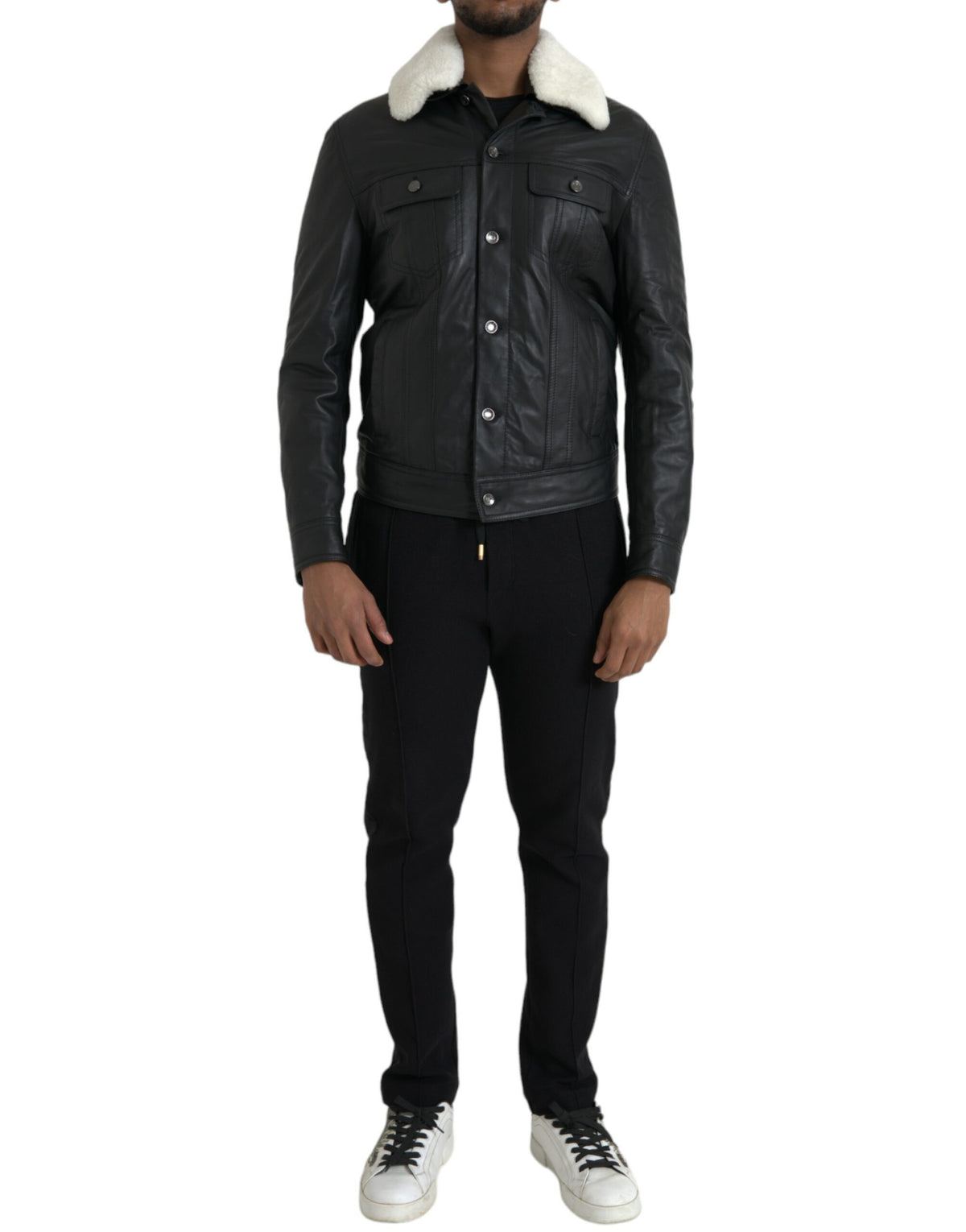 Dolce & Gabbana, veste motard en cuir noir avec col en fourrure.