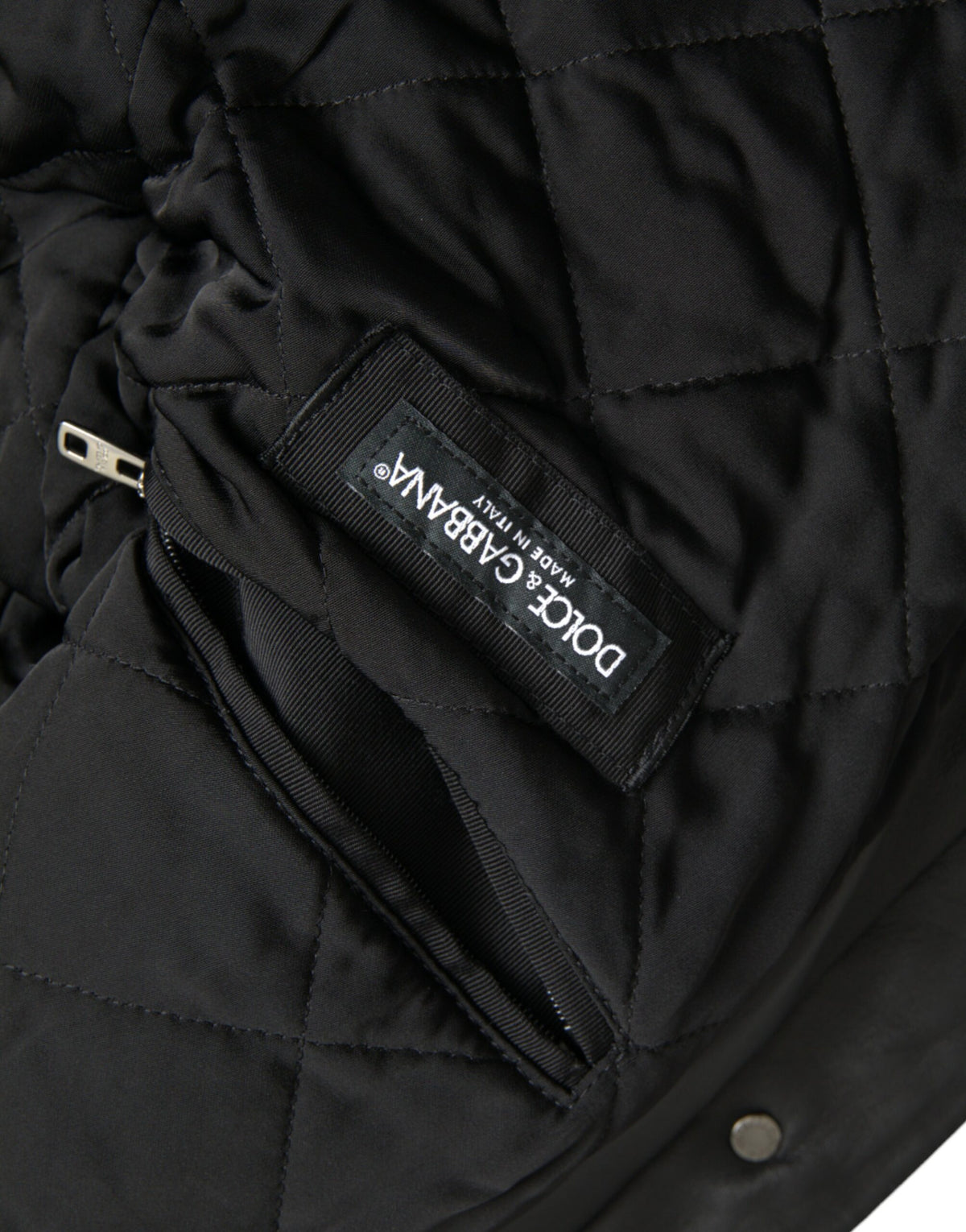 Dolce & Gabbana, veste motard en cuir noir avec col en fourrure.