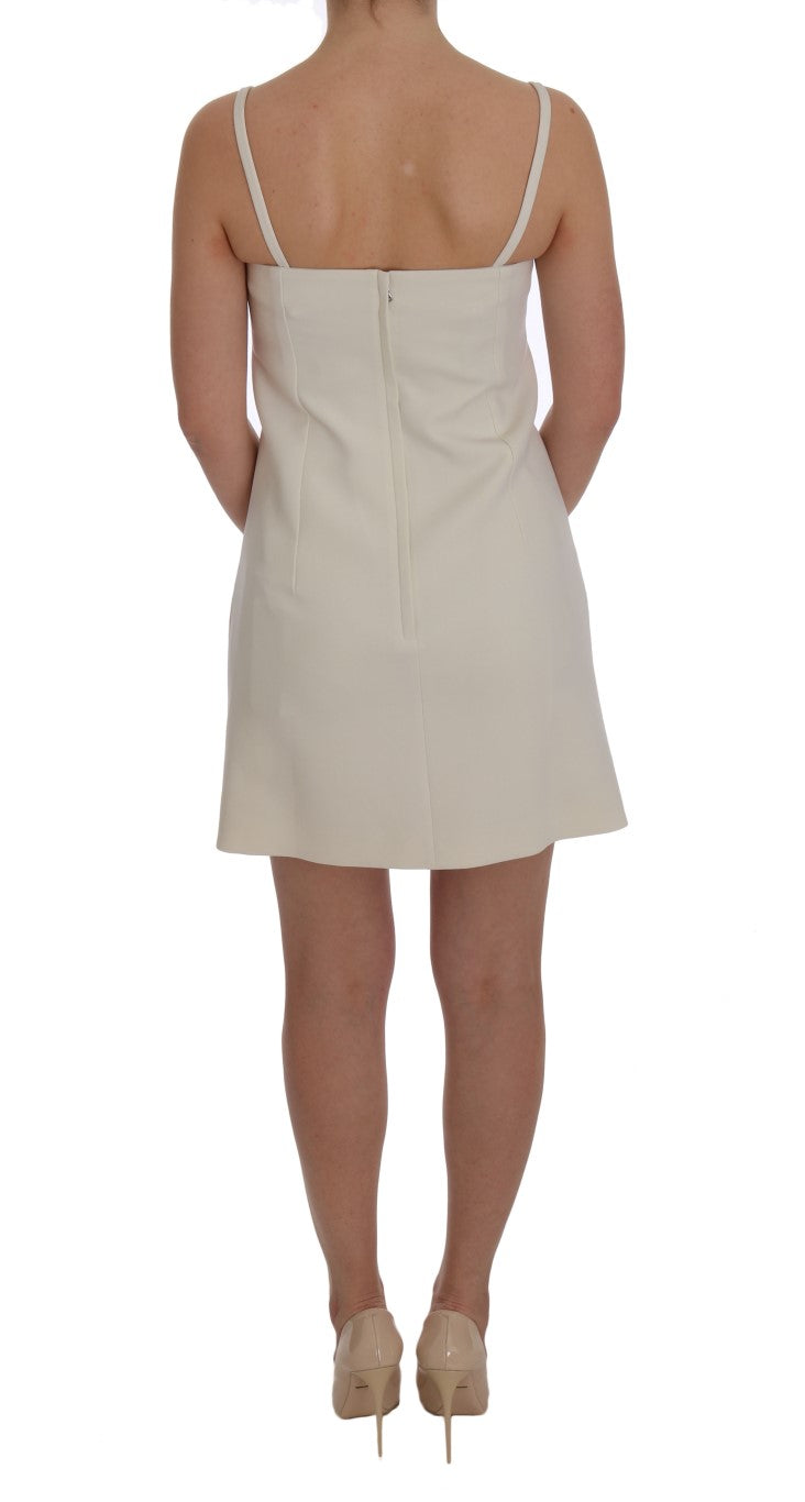 Robe chemise en laine stretch blanche avec broche de Dolce & Gabbana