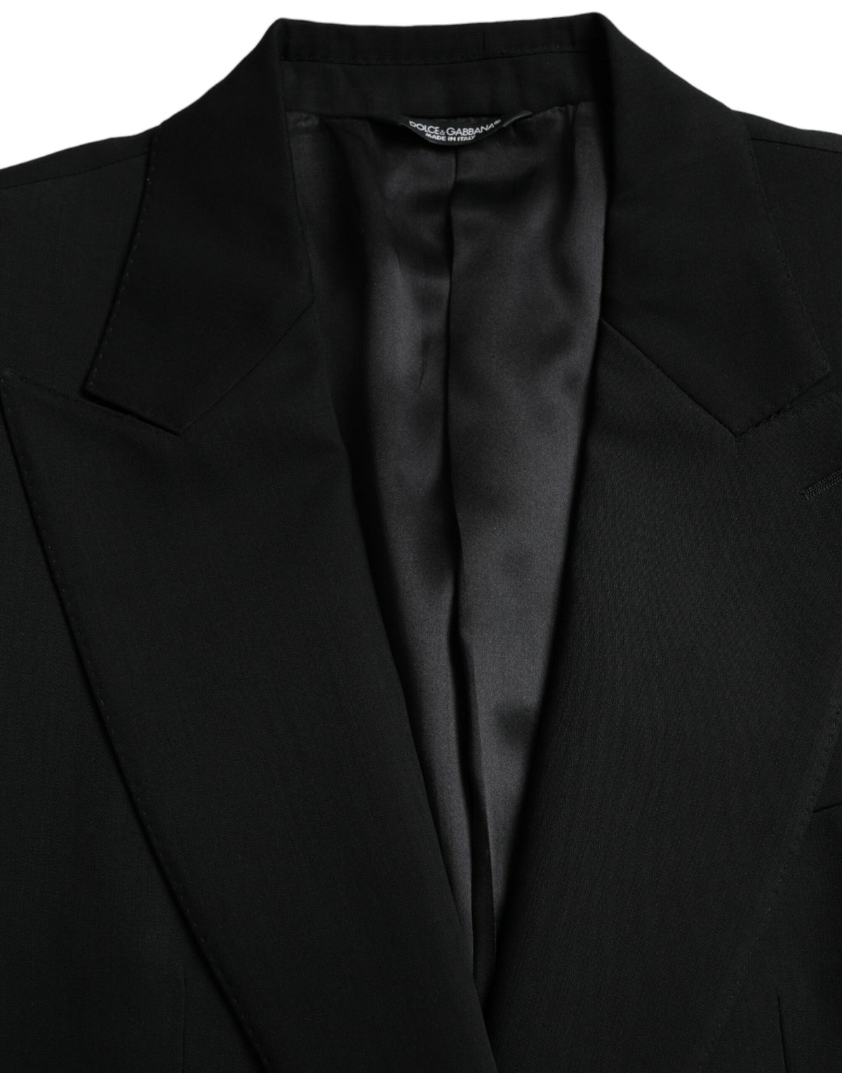 Dolce &amp; Gabbana, blazer noir en laine à revers, à simple boutonnage.