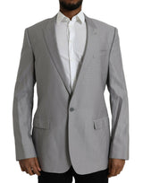 Dolce &amp; Gabbana, veste-blazer grise en laine à revers, à simple boutonnage.