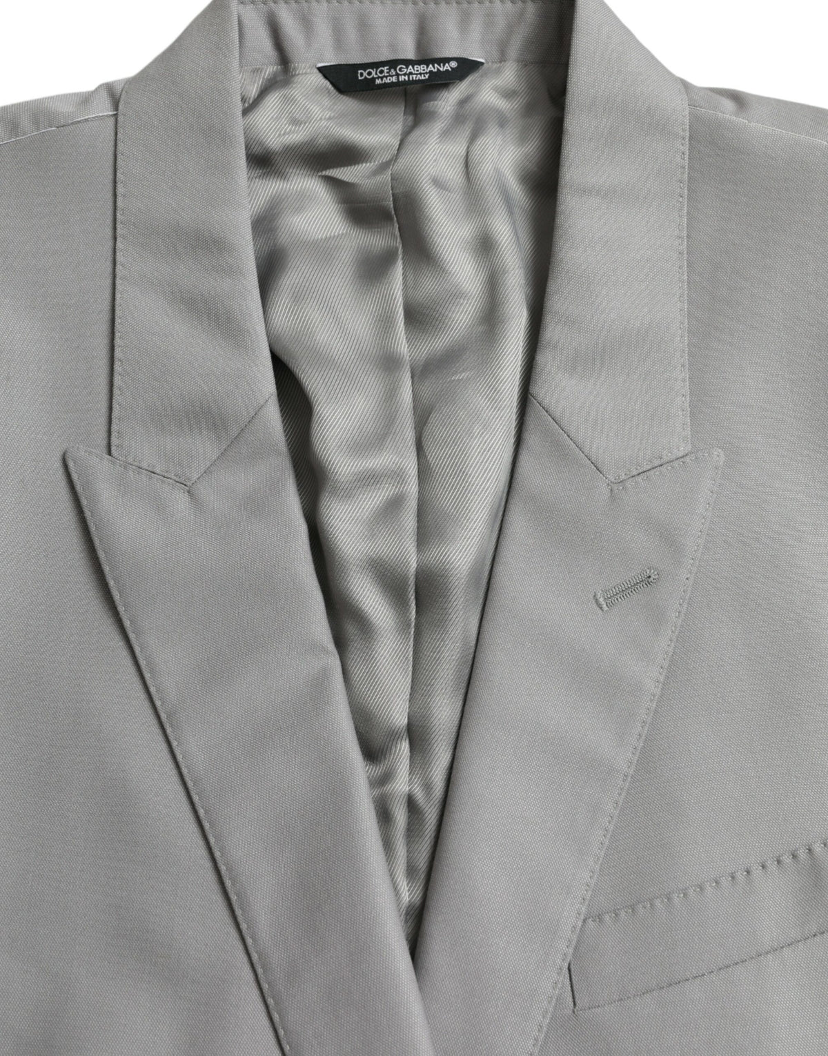 Dolce &amp; Gabbana, veste-blazer grise en laine à revers, à simple boutonnage.