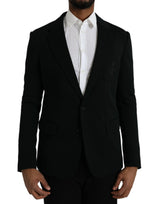 Dolce &amp; Gabbana, blazer noir en laine, col à revers, à simple boutonnage.