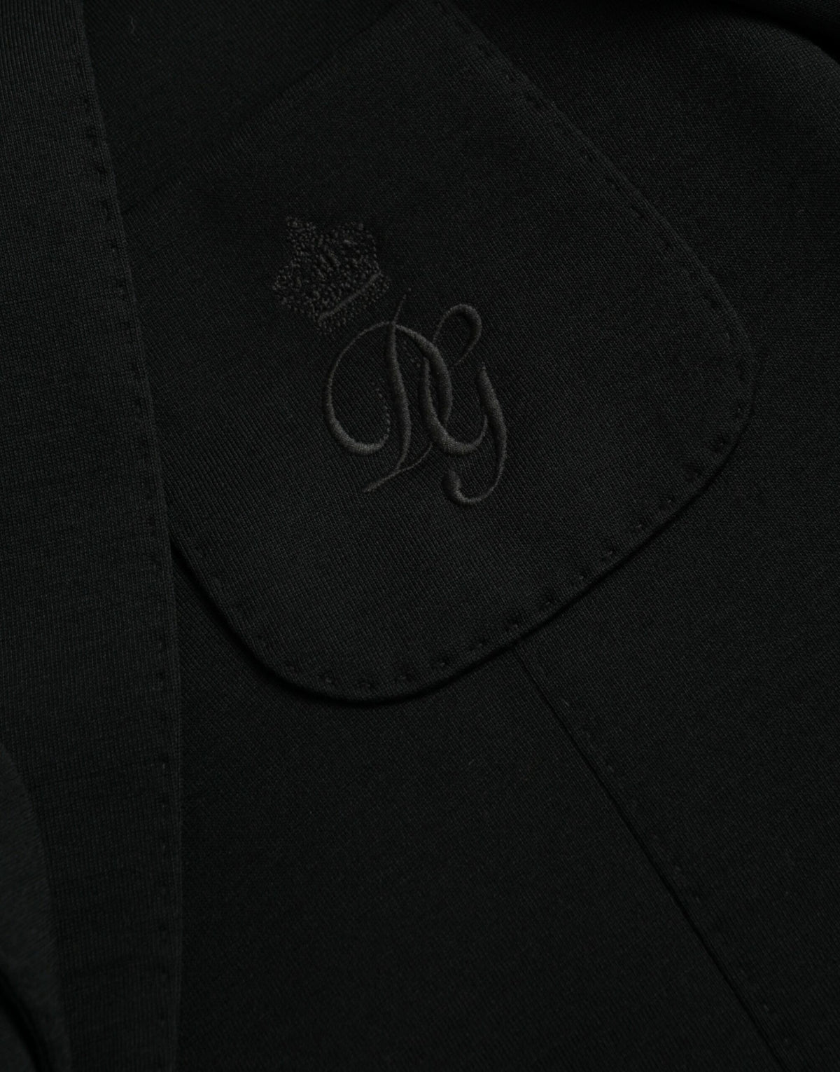 Dolce &amp; Gabbana, blazer noir en laine, col à revers, à simple boutonnage.