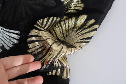 Blouse Dsquared² en soie jacquard dorée et argentée, transparente.