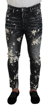 Jeans skinny en jean gris lavé avec imprimé blanc éclaboussé de Dsquared²