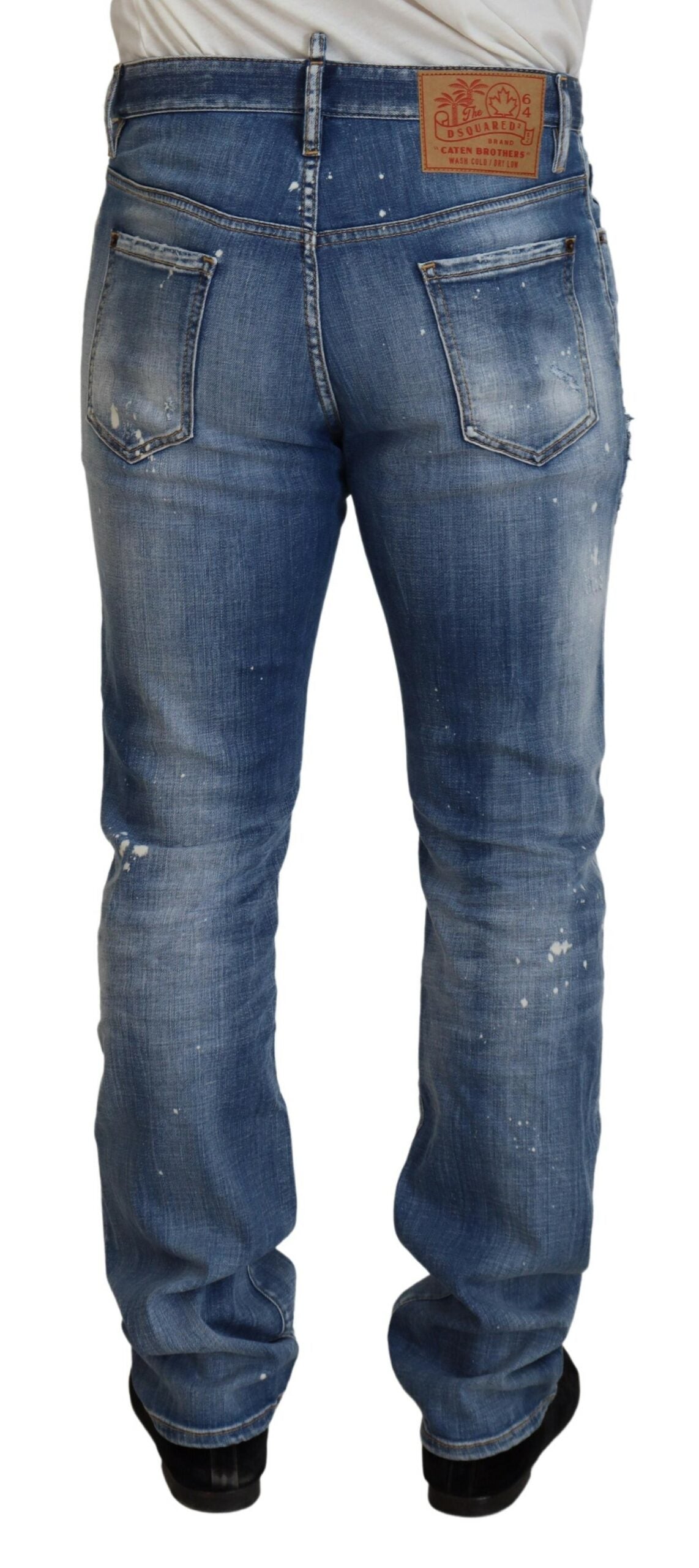 Jeans décontractés Dsquared² en jean bleu, effet usé et déchiré, coupe droite.