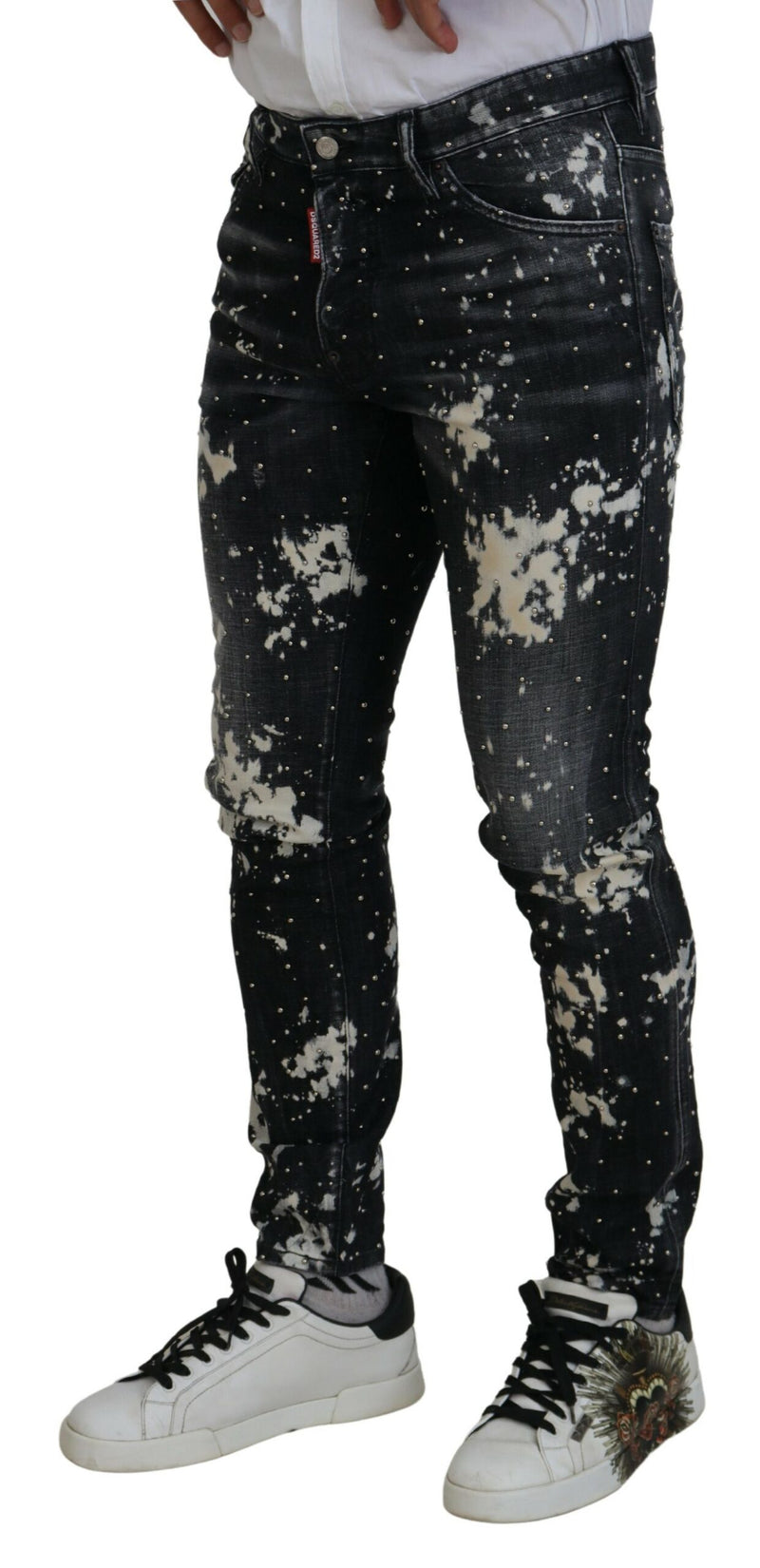 Jeans décontractés en jean noir délavé avec éclaboussures de couleur blanche de Dsquared²
