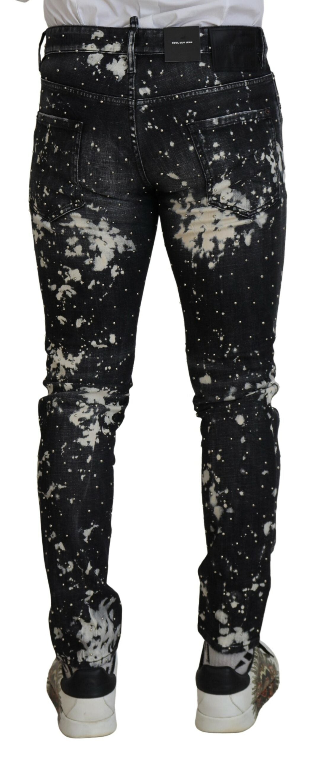 Jeans décontractés en jean noir délavé avec éclaboussures de couleur blanche de Dsquared²