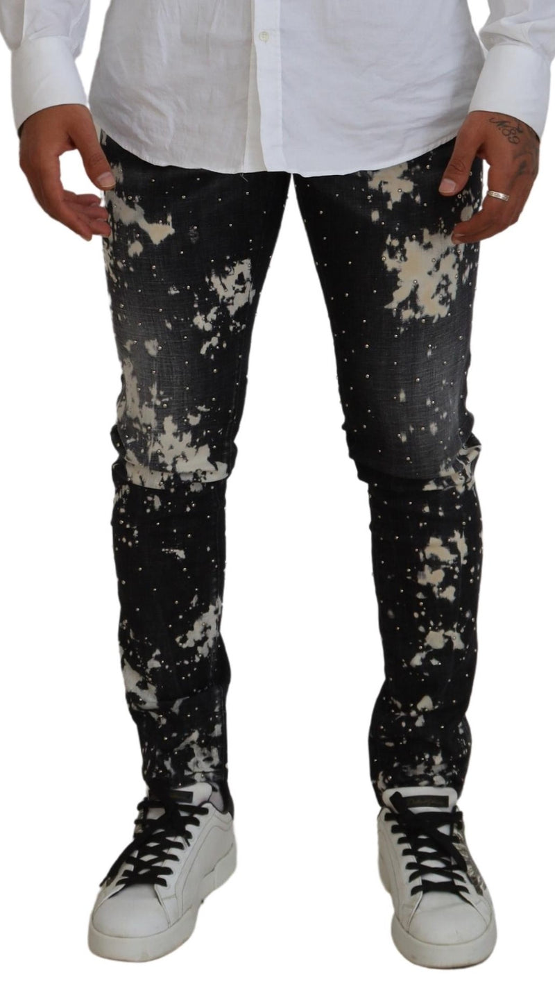 Jeans décontractés en jean noir délavé avec éclaboussures de couleur blanche de Dsquared²