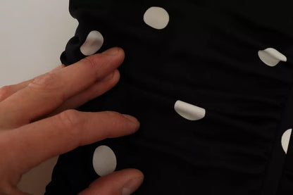 Robe midi portefeuille en soie noire à pois et col en V de Dolce & Gabbana