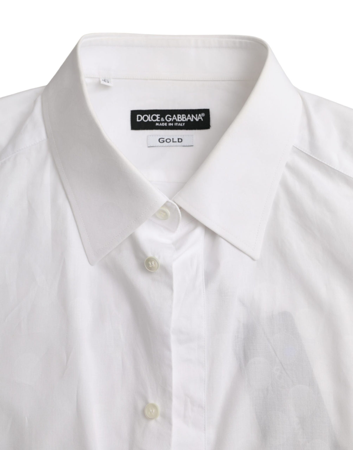 Robe en coton blanche à pois de Dolce &amp; Gabbana, chemise dorée.