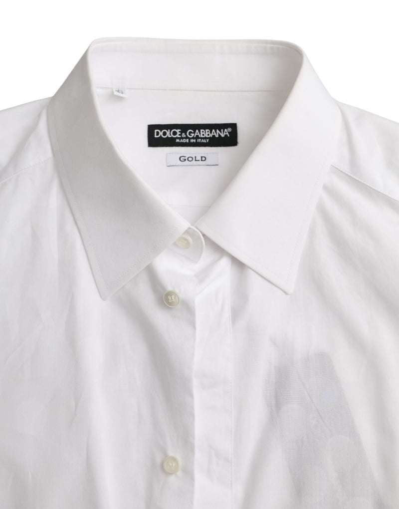 Robe en coton blanche à pois de Dolce &amp; Gabbana, chemise dorée.