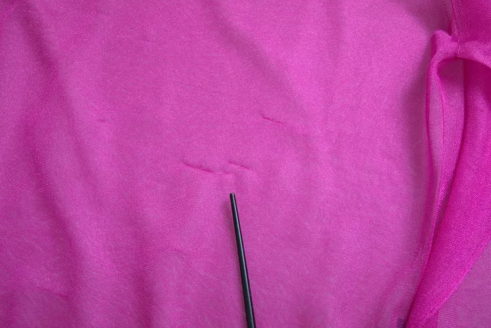 Dolce & Gabbana roze transparante top met ronde hals en lange mouwen