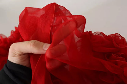 Blouse à col ascot et volants en soie rouge de Dolce & Gabbana