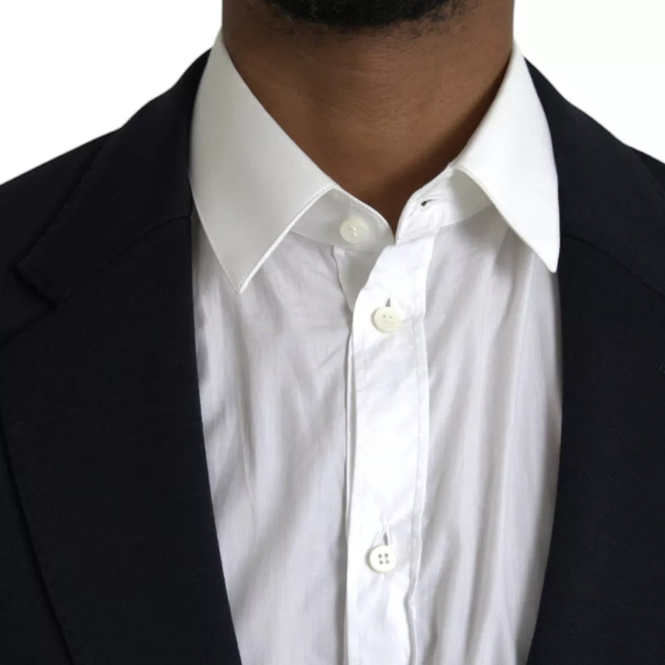 Dolce &amp; Gabbana, blazer bleu en laine à revers, à simple boutonnage.