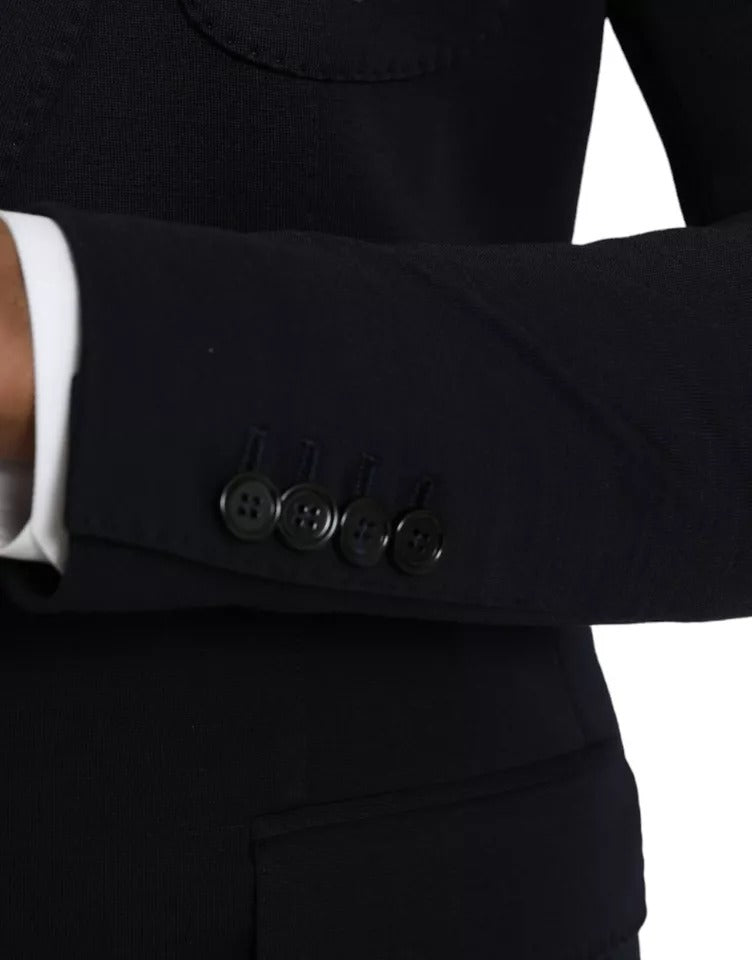 Dolce &amp; Gabbana, blazer bleu en laine à revers, à simple boutonnage.