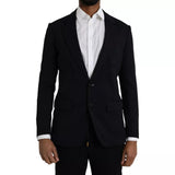 Dolce &amp; Gabbana, blazer bleu en laine à revers, à simple boutonnage.