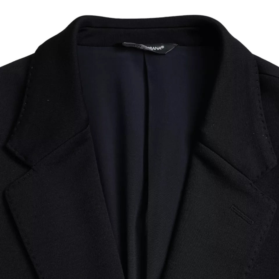 Dolce &amp; Gabbana, blazer bleu en laine à revers, à simple boutonnage.