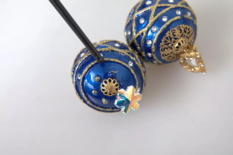 Boucles d'oreilles Dolce & Gabbana en laiton doré et cristaux bleus