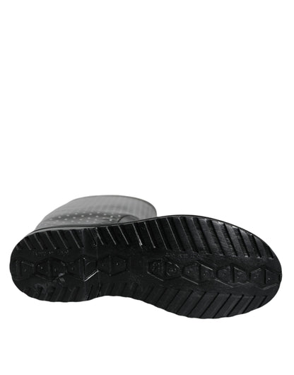 Bottines hautes en caoutchouc noir à pois de Dolce & Gabbana