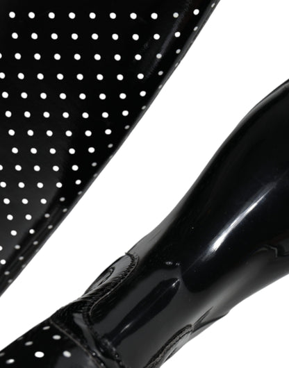 Bottines hautes en caoutchouc noir à pois de Dolce & Gabbana