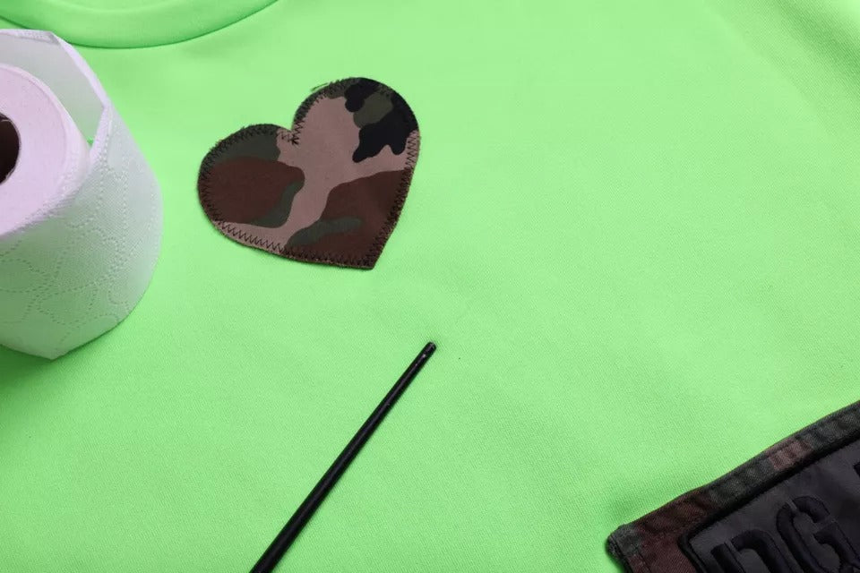 Pull en tricot à col rond avec motif patchwork en forme de cœur vert de Dolce &amp; Gabbana