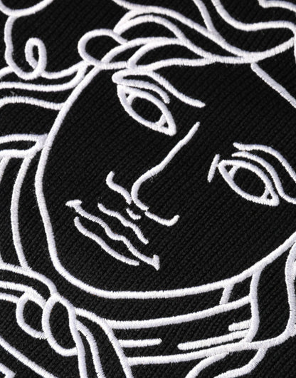 Pull en jersey à col rond brodé de la Méduse noire de Versace