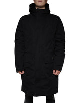 Dolce & Gabbana Parka noire à capuche, trench-coat en coton.
