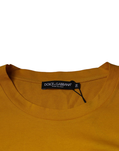 Dolce &amp; Gabbana T-shirt met ronde hals en reliëflogo in mosterdgeel