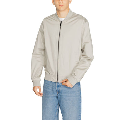 Calvin Klein Grijze Jacketten &amp; Mantels van Biologisch Katoen