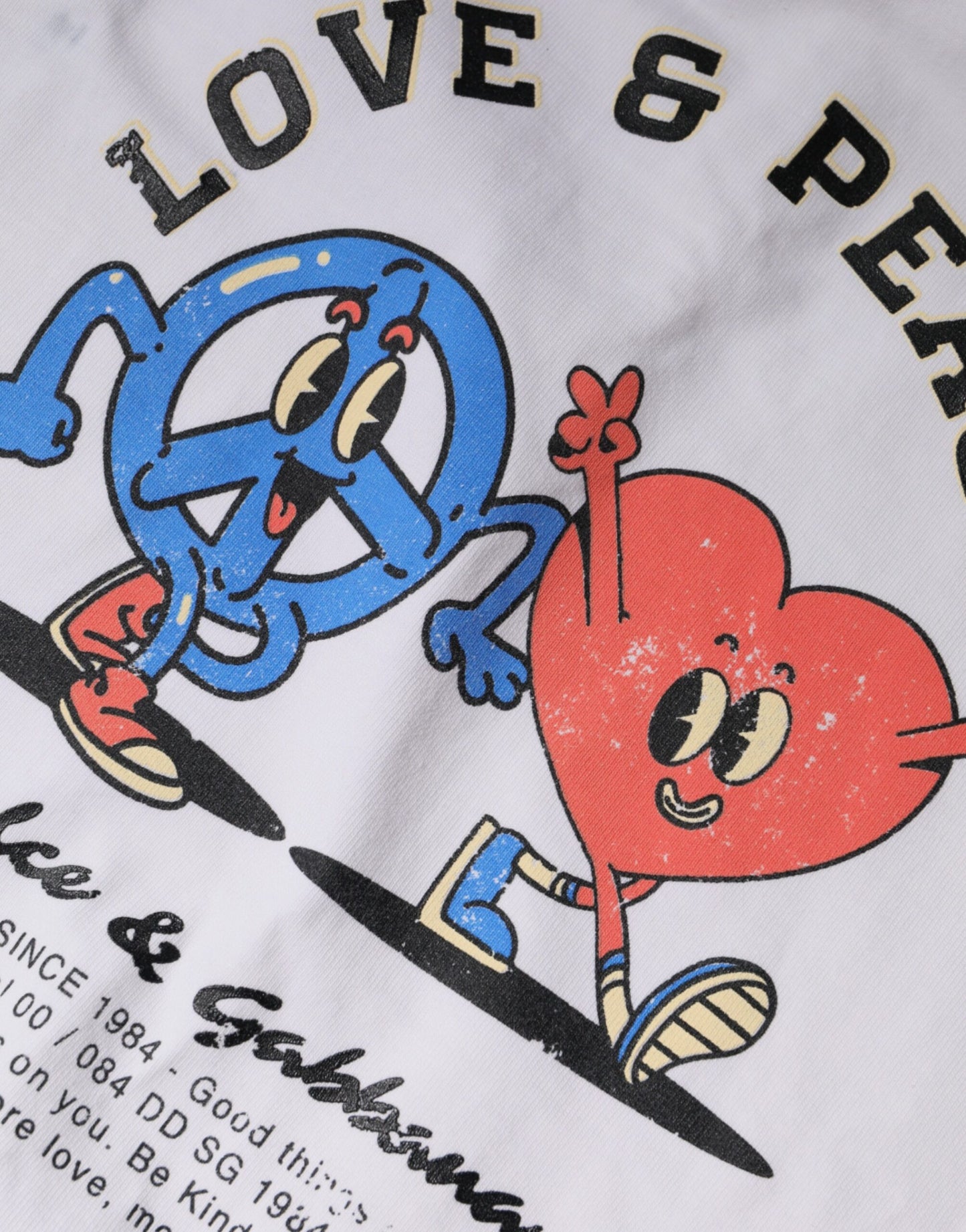 T-shirt Dolce &amp; Gabbana blanc en coton à col rond avec le slogan "Love &amp; Peace"
