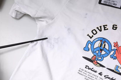 T-shirt Dolce &amp; Gabbana blanc en coton à col rond avec le slogan "Love &amp; Peace"