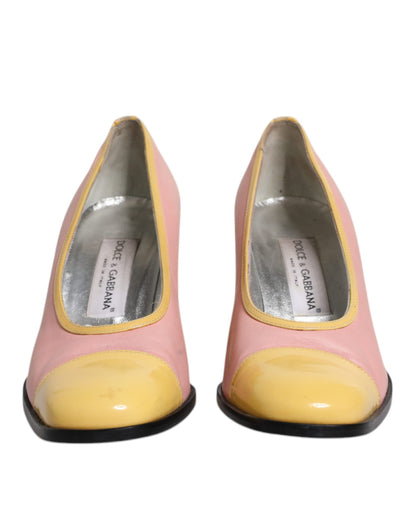 Dolce &amp; Gabbana roze en gele leren pumps met blokhak.