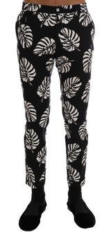 Pantalon slim en coton stretch blanc et noir Dolce &amp; Gabbana à motif feuilles noires