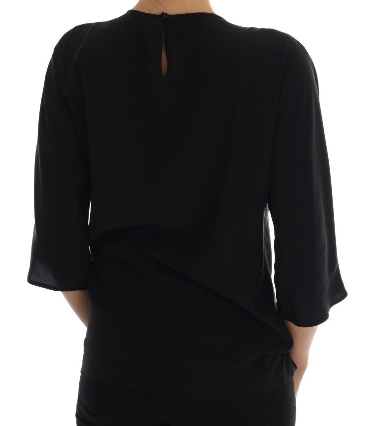 Dolce &amp; Gabbana Top en soie noire à motif féerique et chemisier orné de cristaux
