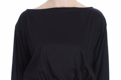 Robe portefeuille en soie et modal noir de Versace Jeans, longueur genou.